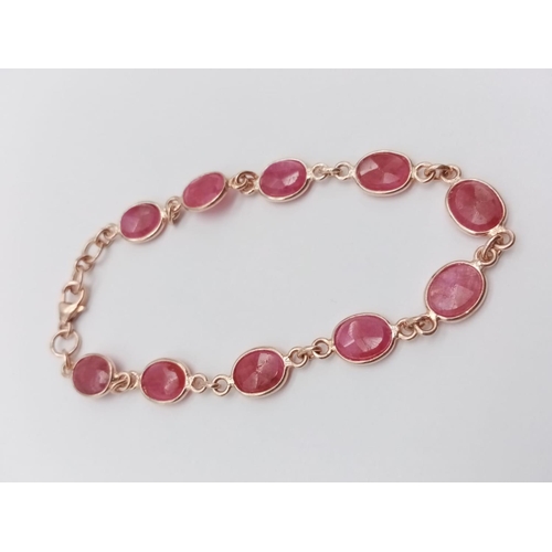 817 - A ruby chain bracelet, Garnet bracelet and three stone ring SIZE O in 925 silver