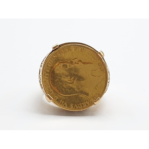 147 - An antique gold ring (tests 18ct) with a half sovereign of King Edward VII and dated 1909. Total wei... 