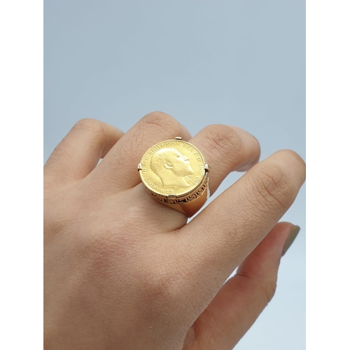 147 - An antique gold ring (tests 18ct) with a half sovereign of King Edward VII and dated 1909. Total wei... 