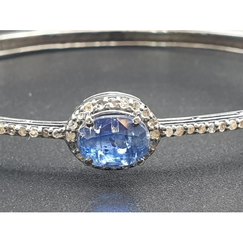 153 - 925 Silver bangle set with 3 Oval cut Kyanites & 92 Rose cut diamonds of approx 3cts
W.G.I (World Ge... 