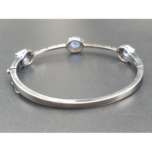 153 - 925 Silver bangle set with 3 Oval cut Kyanites & 92 Rose cut diamonds of approx 3cts
W.G.I (World Ge... 