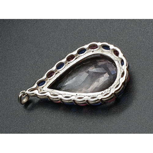 160 - A large 925 SILVER PENDANT SET, WITH ONE PEAR SHAPED NATURAL MORGANITE CENTRE AND EIGHTEEN OVAL CUT,... 