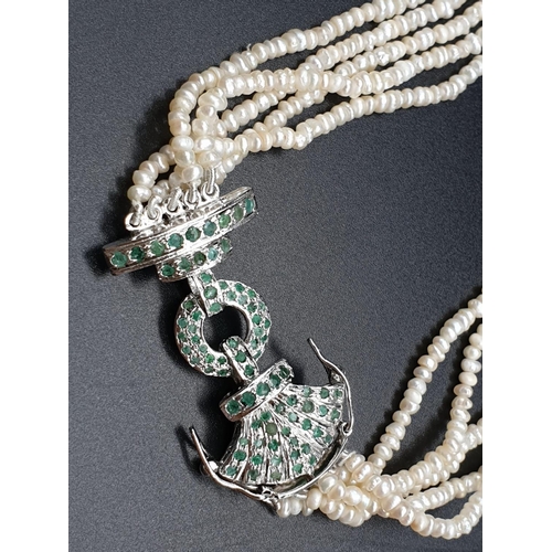 167 - An elegant 925 SILVER NECKLACE SET WITH EIGHTY ONE ROUND CUT NATURAL EMERALDS CLASP AND THREE STRAND... 