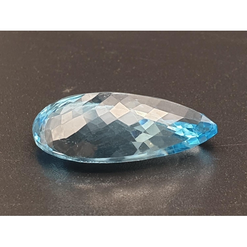 174 - A very large 29.30cts pear shaped Blue Topaz stone with W.G.I (World Gemmological Institute) UK Cert... 