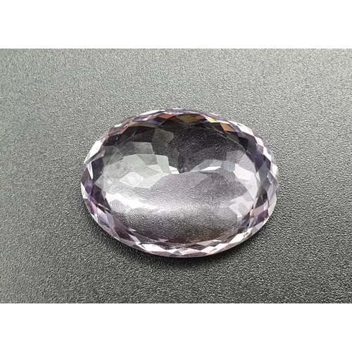 181 - A very large oval 33cts Natural Amethyst stone with W.G.I (World Gemmological Institute) UK Certific... 