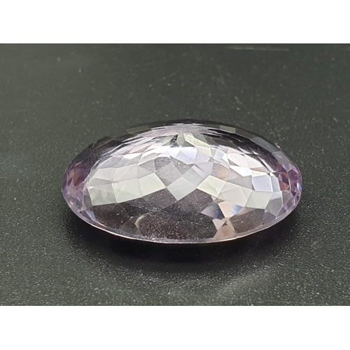 181 - A very large oval 33cts Natural Amethyst stone with W.G.I (World Gemmological Institute) UK Certific... 