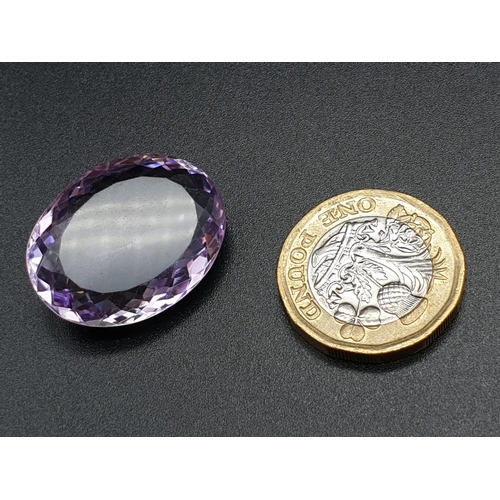 181 - A very large oval 33cts Natural Amethyst stone with W.G.I (World Gemmological Institute) UK Certific... 