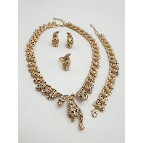 246 - A very glamorous, Cartier Panther style, gold plated complete set, consisting of necklace, bracelet,... 