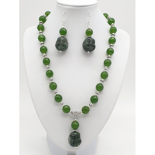 250 - A Tibetan silver and green jade necklace and earrings set with hand carved smiling Buddha head penda... 