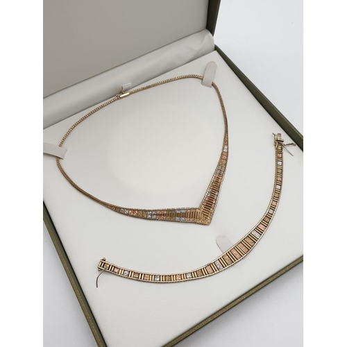 274 - A 9 carat tri-colour necklace and bracelet set in excellent condition. Necklace length: 40cm, weight... 