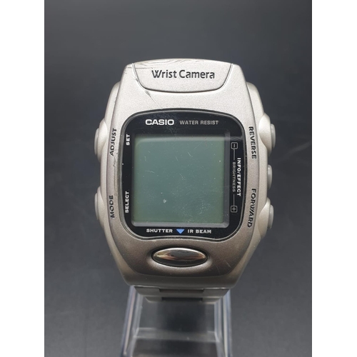 302 - A Rare Casio Wrist WQV-1 Camera Watch. Stainless Steel strap. Comes with all original paperwork. Inf... 