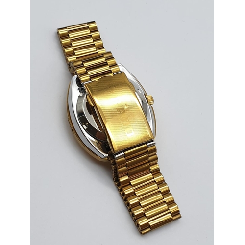 386 - A gents RADO DIASTAR, automatic, gold plated, watch in its original Rado presentation box. In very g... 