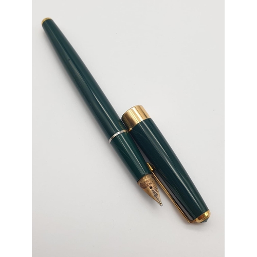 433 - Two Vintage Parker Pens. A Green Fountain Pen with 14K Gold Nib and a Gold Plated Ballpoint.