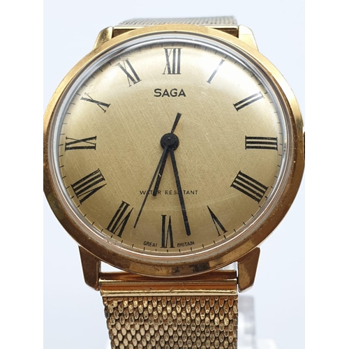 447 - Vintage Saga Men's Wristwatch. Gold Plated Strap and Case, Gold Dial. In Full Working Order.