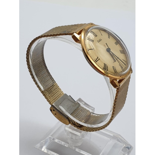 447 - Vintage Saga Men's Wristwatch. Gold Plated Strap and Case, Gold Dial. In Full Working Order.