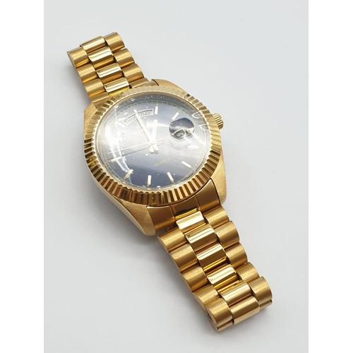 487 - Astron Gold Plated Watch. Blue Dial, Day and Date. As New, In Box. As Found - needs new battery.