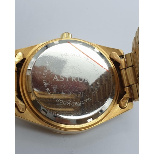 487 - Astron Gold Plated Watch. Blue Dial, Day and Date. As New, In Box. As Found - needs new battery.