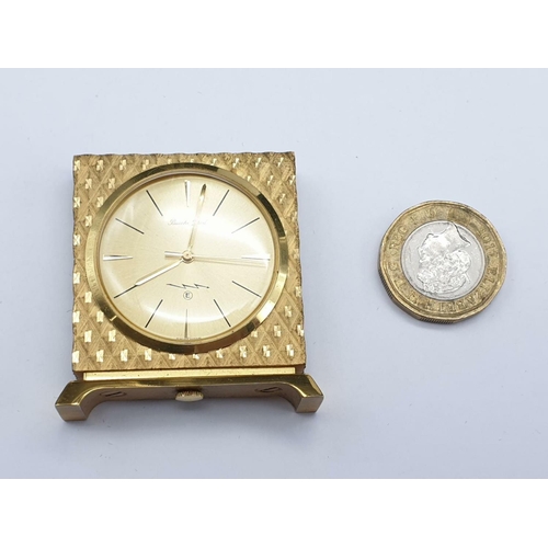 890 - A Bueche Girod marked Gold Tone Miniature Clock.
As found. 4 x 4cm