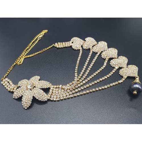 867 - Get ready for the summer ball! A beautiful yellow metal and Swarovski crystals asymmetric necklace a... 