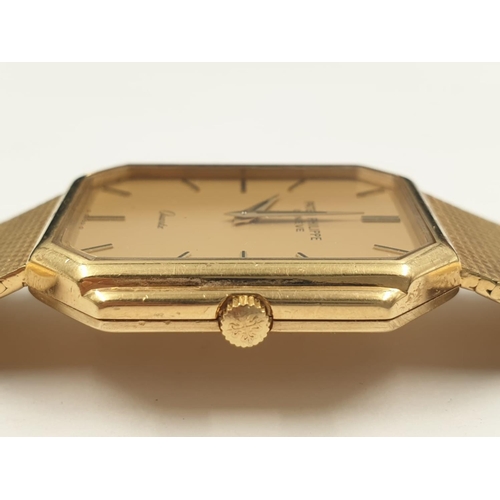 14 - A PATEK PHILIPPE 18K GOLD GENTLEMANS WRIST WATCH WITH SOLID GOLD STRAP AND QUARTZ MOVEMENT. 300MM