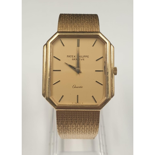 14 - A PATEK PHILIPPE 18K GOLD GENTLEMANS WRIST WATCH WITH SOLID GOLD STRAP AND QUARTZ MOVEMENT. 300MM