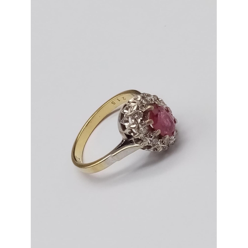 194 - 18k yellow gold ring with ruby centre and diamond surrounds, size O weight 4.3g