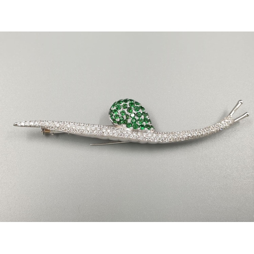 66 - Mappin & Webb 18k white gold brooch in the shape of a snail set in diamonds and tsavorite stones, we... 