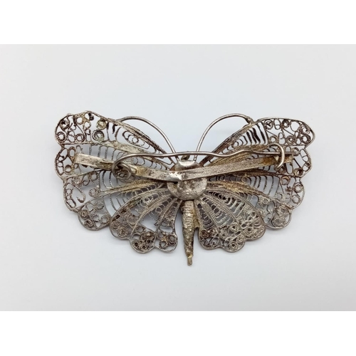 675 - Silver filigree butterfly brooch weight 13g , 45x75mm approx