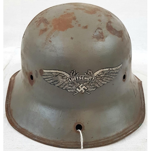 114 - WW2 German Luftschutz Helmet (air raid police) No Liner. There is an extra hole drilled in the peak ... 