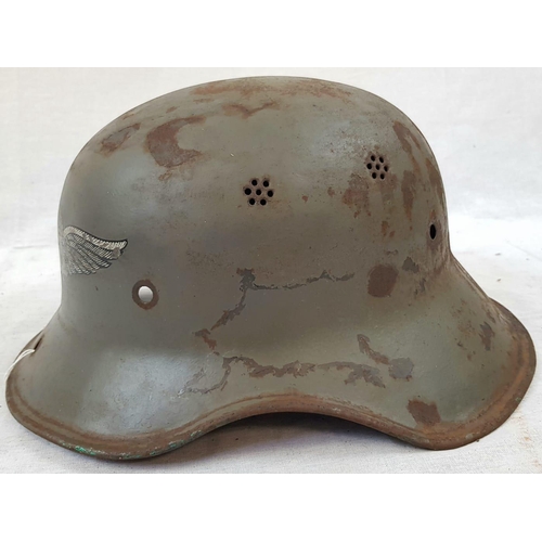 114 - WW2 German Luftschutz Helmet (air raid police) No Liner. There is an extra hole drilled in the peak ... 