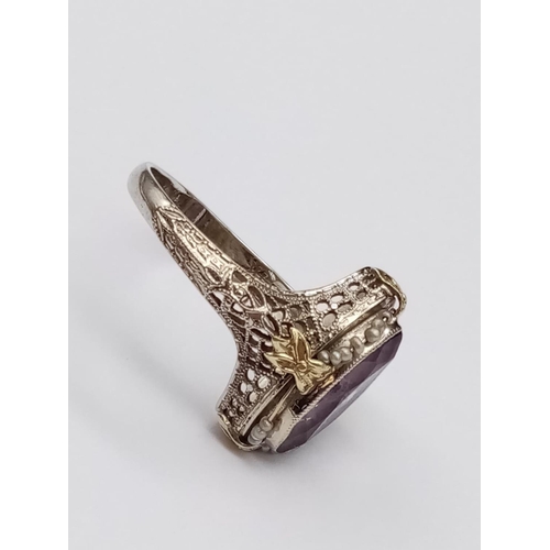 134 - Vintage 14k yellow gold ring with boat shaped amethyst centre and seed pearl decoration with filigre... 