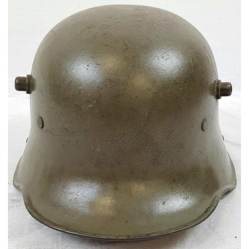 71 - WW1 German M16 Stahlhelm Helmet with liner and original paint. Unusual field repair to one of the ch... 