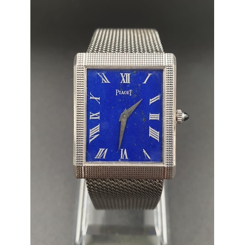 49 - A LADIES 18K WHITE GOLD WRIST WATCH BY PIAGET WITH A RARE BLUE FACE IN  SQUARE TANK STYLE.
23mm