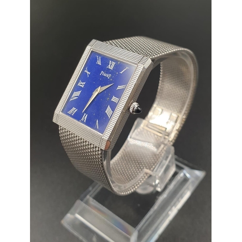 49 - A LADIES 18K WHITE GOLD WRIST WATCH BY PIAGET WITH A RARE BLUE FACE IN  SQUARE TANK STYLE.
23mm