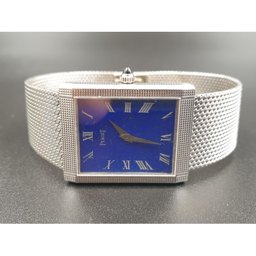 49 - A LADIES 18K WHITE GOLD WRIST WATCH BY PIAGET WITH A RARE BLUE FACE IN  SQUARE TANK STYLE.
23mm