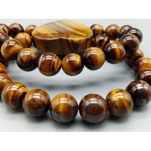 560 - Double strand tiger's eye bracelet with large heart shape stone and stretchable band