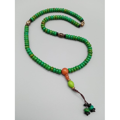 750 - Green turquoise, black onyx and red jade bead chain, weight 65g approx