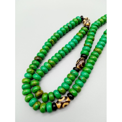 750 - Green turquoise, black onyx and red jade bead chain, weight 65g approx