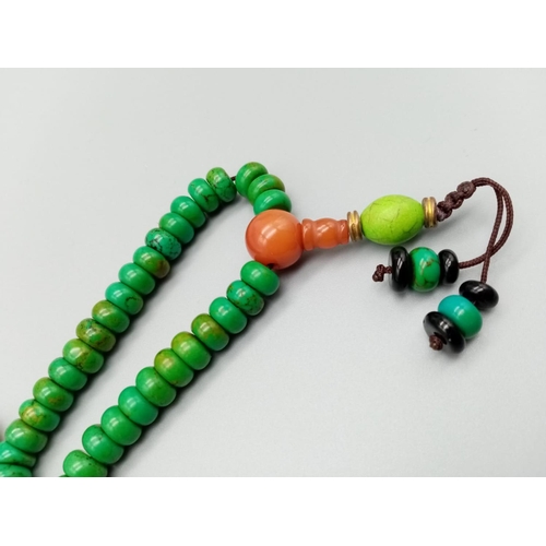 750 - Green turquoise, black onyx and red jade bead chain, weight 65g approx