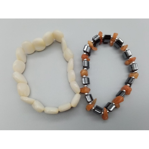 790 - 2x fashion bracelets stretchable bands, one is mother of pearl the other with carnelian stones