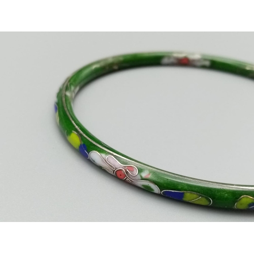 813 - Vintage enamel bangle with floral design 7.5cm diameter