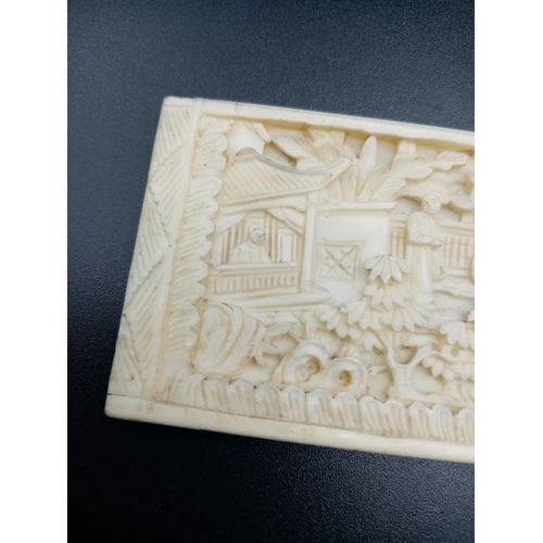 261 - Vintage hand carved Oriental ivory depicting a musical performance in garden scene