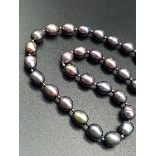 553 - Dark colour pearl necklace silver clasp baroque shape various shades 46cm long