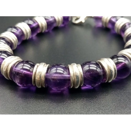 647 - Amethyst and silver bracelet weight 40g 20cm long approx