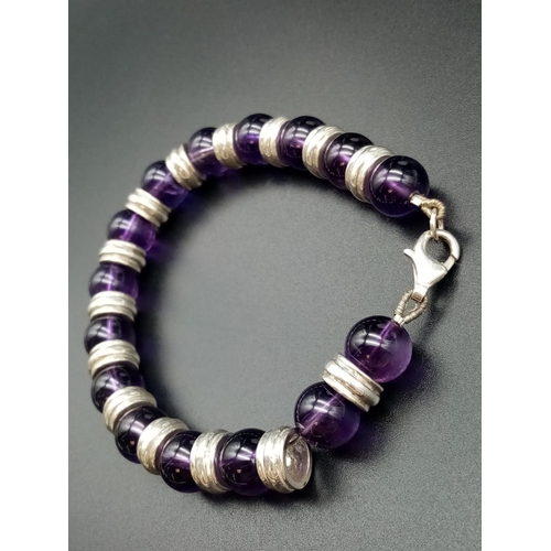 647 - Amethyst and silver bracelet weight 40g 20cm long approx