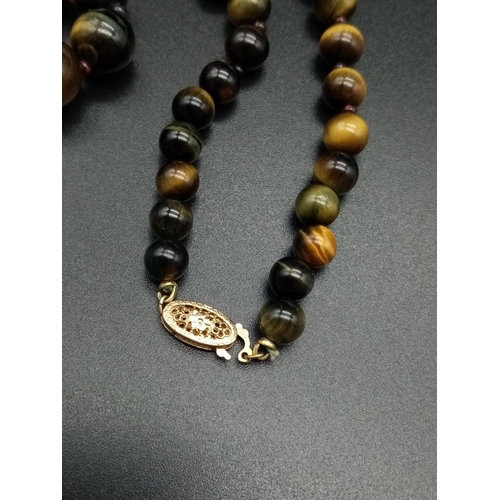 822 - Beautiful gradual tiger's eye beaded necklace in 14k yellow gold clasp, 40cm long approx