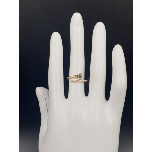 516 - 9K YELLOW GOLD CARTIER STYLE RING WEIGHT 3G SIZE K