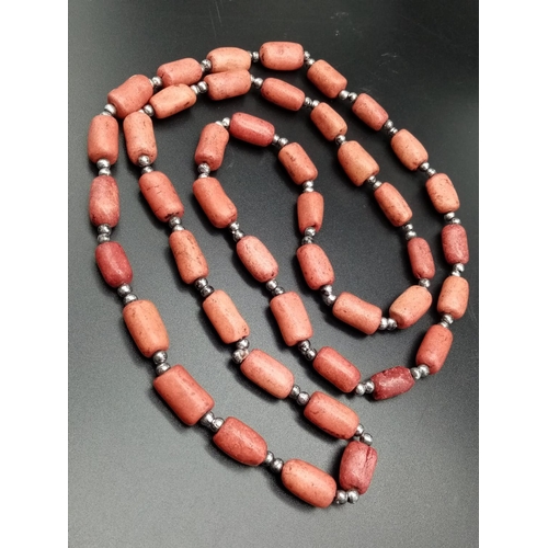 816 - Very long natural red stone beaded chain, 120cm long