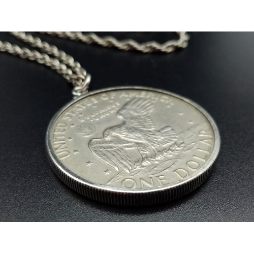 763 - 1974 Liberty 1 Dollar USA coin pendant set in silver chain, 68cm long approx