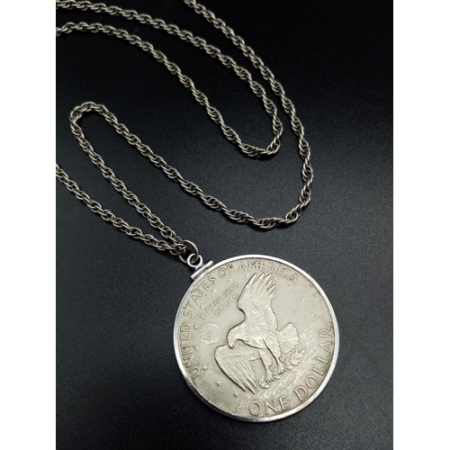 763 - 1974 Liberty 1 Dollar USA coin pendant set in silver chain, 68cm long approx